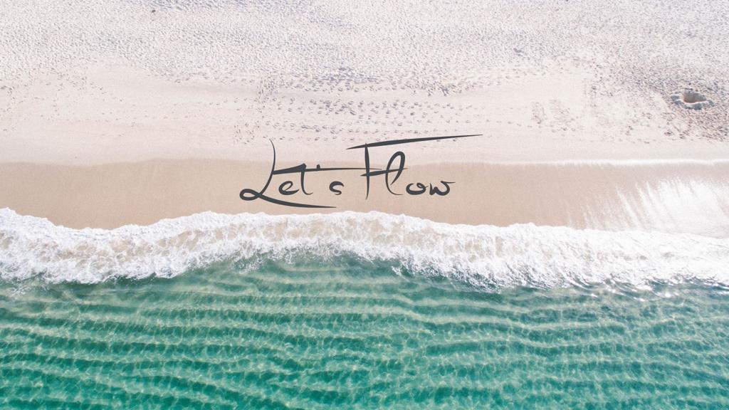 Let's Flow — piaszczysta plaża i turkusowa fala